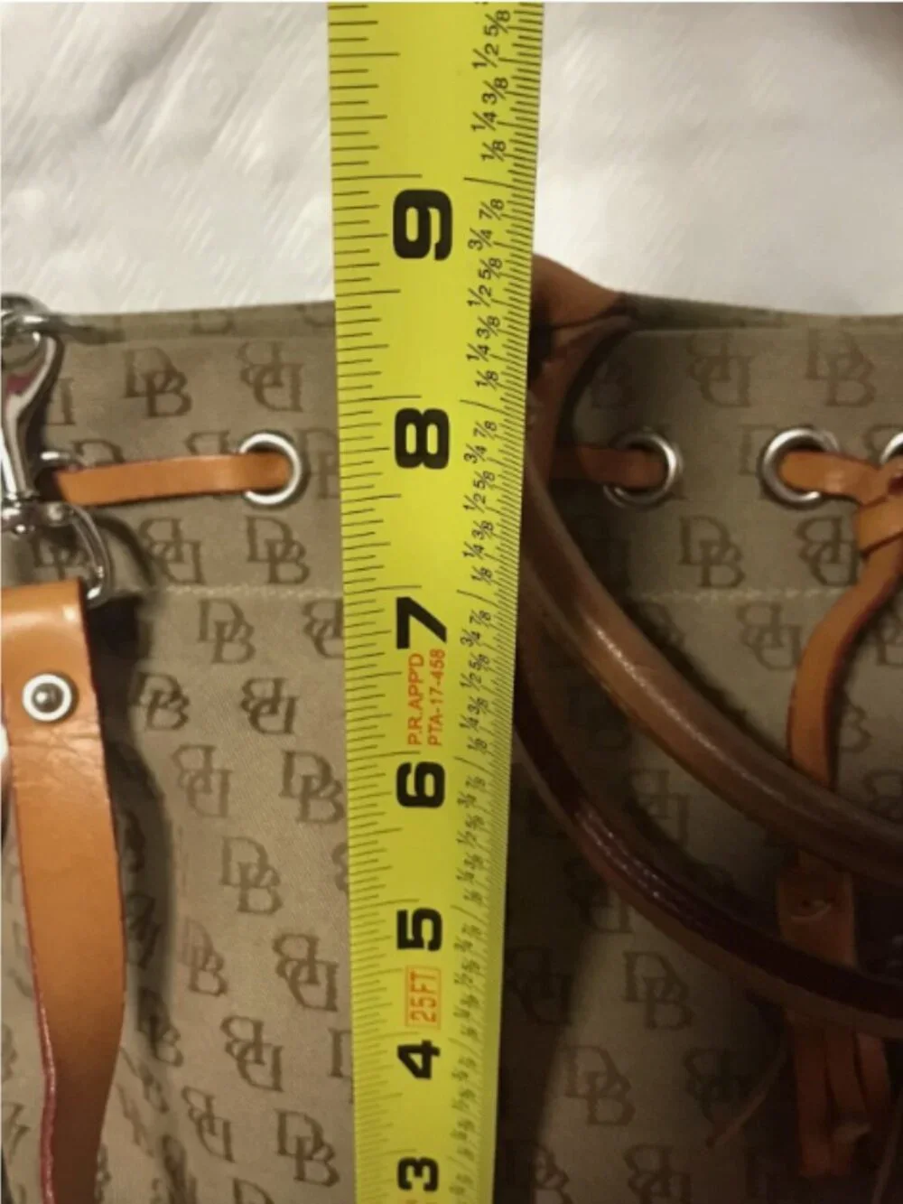 VINTAGE DOONEY AND BOURKE SIGNATURE TASSEL CANVAS LEATHER SHOULDER BAG